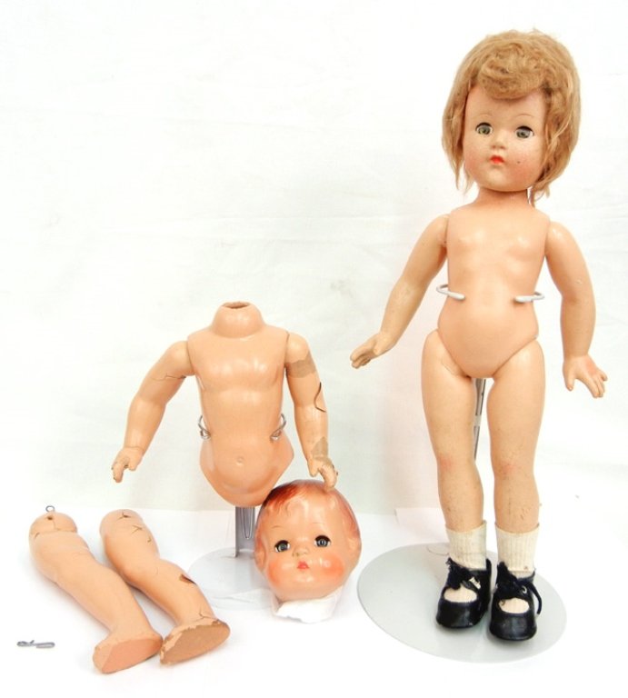 Two Effanbee composition dolls, one is 18", green sleep: Two Effanbee composition dolls, one is 18", green sleep eyes, painted and applied lashes, painted closed mouth, marked on back "Effanbee U.S.A.", and a Candy Kid composition, 17", blue sleep eyes, pai