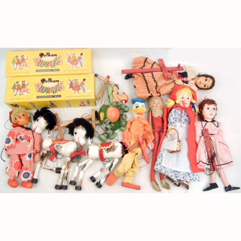 Grouping of marionettes, Pelham's and Hazelle's,: Grouping of marionettes, Pelham's and Hazelle's, including Red Riding Hood, two boxed horses, dragon, Donald Duck, two women, elf, and an accordian player, ten total