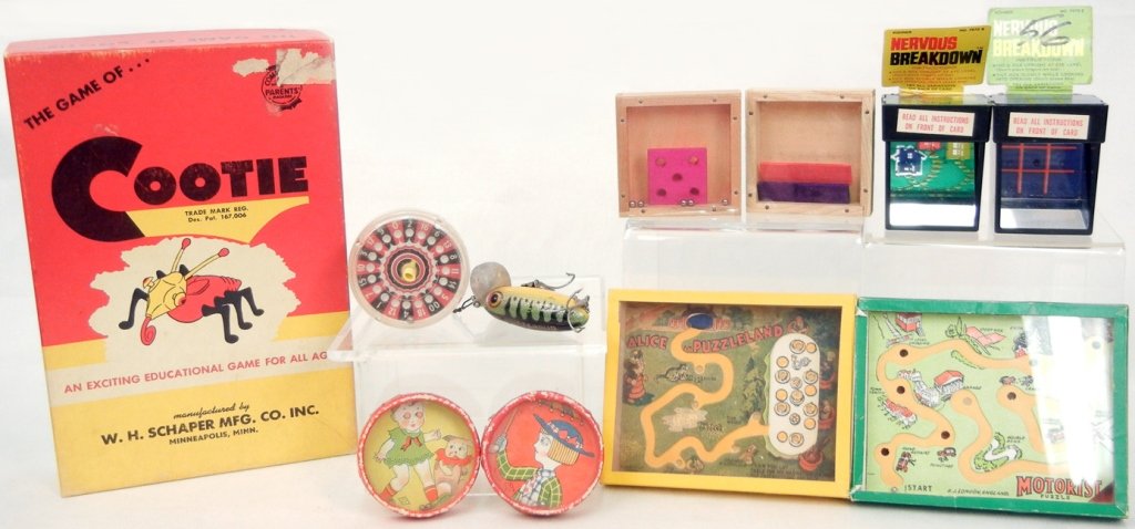 Grouping of games and puzzles, including two R. Journet: Grouping of games and puzzles, including two R. Journet & Co. LTD., puzzles of Alice in Puzzleland and Motorist Puzzle, two C.I. Japan puzzles, Roulette spin toy with dice on underside, two try your p
