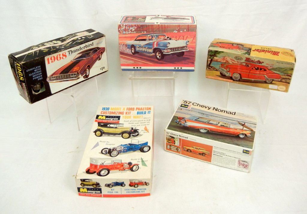 Grouping of five model car kits, including AMT '56: Grouping of five model car kits, including AMT '56 Ford, Mechanical & Automatic Minister Delux, Revell '57 Chevy Nomad, Palmer 1968 Thunderbird with an electric power pac, and a Monogram 1930 Model A