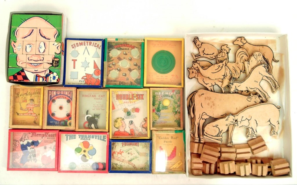 Grouping of vintage toys, including twelve wooden cut: Grouping of vintage toys, including twelve wooden cut out farm animals with stands, wooden puzzle block with faces, and twelve R. Journet London, England puzzles, including Ringtail Cat, Beehive, the 