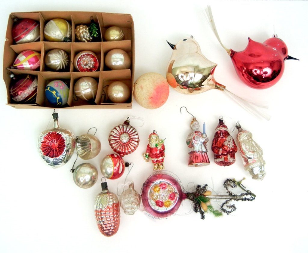 Grouping of twenty-eight vintage glass blown ornaments,: Grouping of twenty-eight vintage glass blown ornaments, including fruit, wire wrapped ornament, two birds, heart shaped ones, angel, two santas, glass head, balls, and more