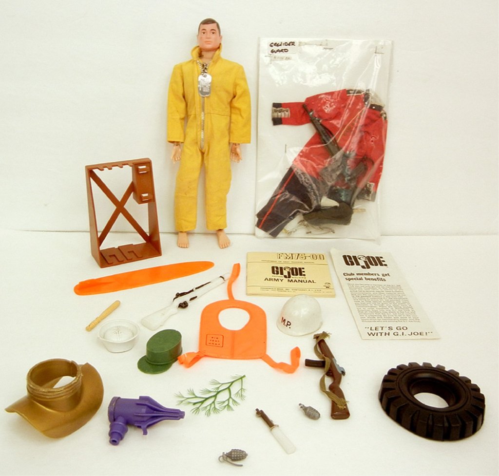 GI Joe action figure, wearing yellow jumpsuit, with: GI Joe action figure, wearing yellow jumpsuit, with working talker, 1960s, with miscellaneous accessories, and rare Action Man Grenadier Guard outfit, 11 1/2"
