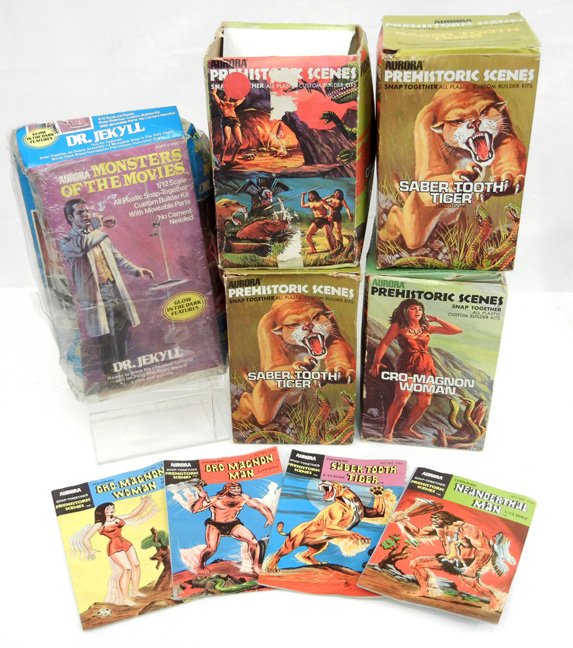 Four Aurora models, including Prehistoric Scenes: Four Aurora models, including Prehistoric Scenes kits of Saber Tooth Tiger, Cro-Magnon Woman and Cro-Magnon Man, and a Dr. Jekyll, all in original boxes, with four additional pamphlets, and an exra Sa