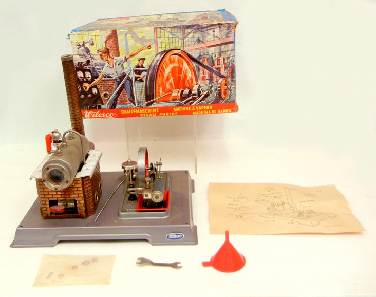 Wilesco Steam Engine in original box,: Wilesco Steam Engine in original box, Made in Western Germany, with instructions, appears complete in box, box measures 6 1/4" x 11" x 9"