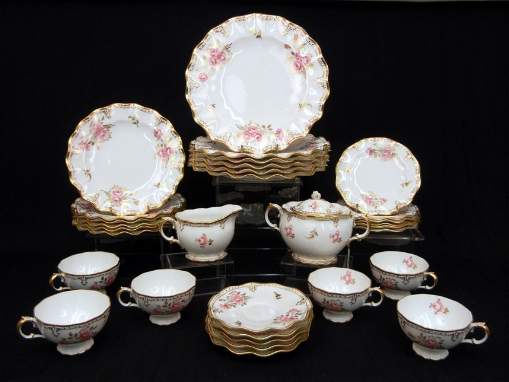 Set of Royal Crown Derby "Royal Pinxton Roses" bone chi: Set of Royal Crown Derby "Royal Pinxton Roses" bone china dinnerware, includes six 10 1/2" dinner plates, six 8 1/4" plates, six 6 1/4" plates, six 2 1/2" teacups, five 5 3/4" saucers, 3 1/4" creamer,