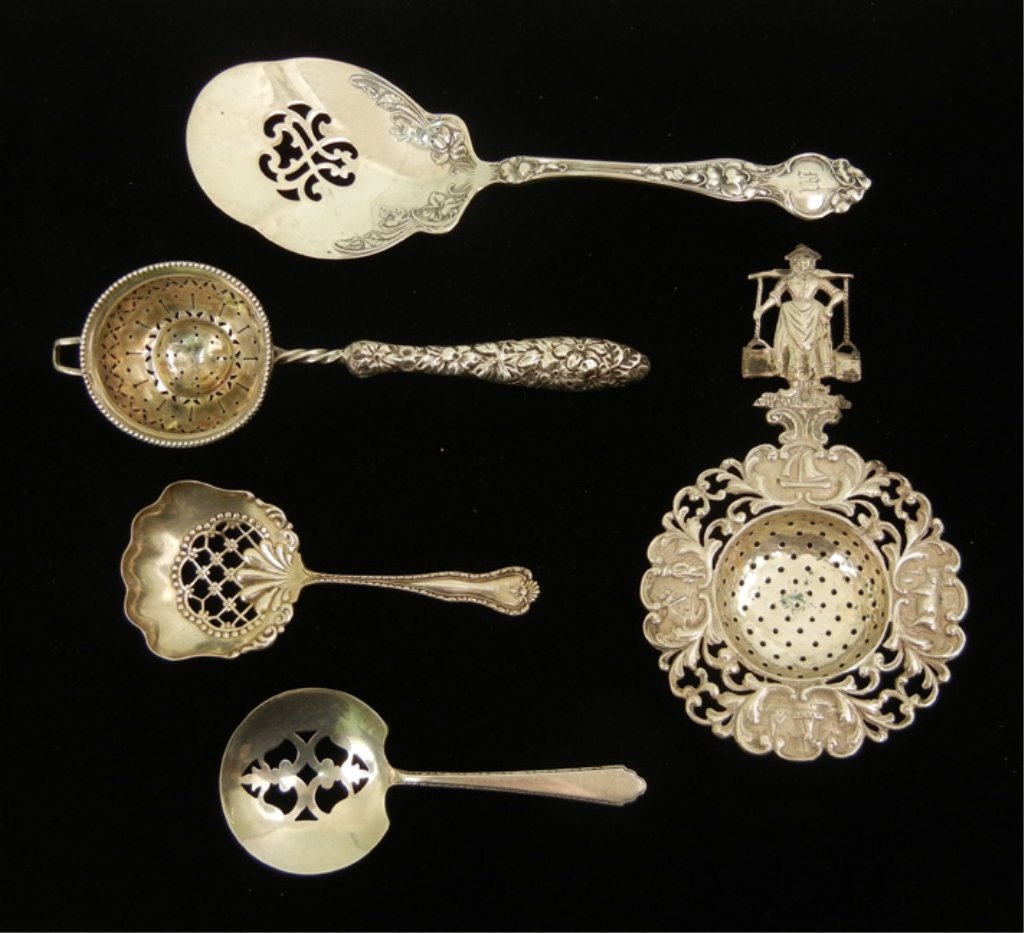 Grouping of sterling silver flatware serving pieces, in: Grouping of sterling silver flatware serving pieces, includes Gorham tea strainer 6 3/4", Hamilton & Davis spoon in HMD 4 pattern 4 1/2", Wallace pierced spoon "Violet", monogrammed W 8", and a tea st