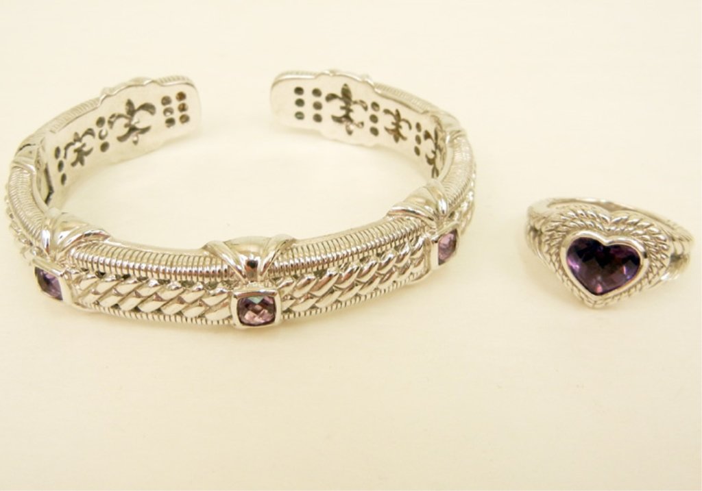 Judith Ripka sterling silver and purple stone cuff brac: Judith Ripka sterling silver and purple stone cuff bracelet and ring, inside dimensions of bracelet are 2 1/2" long x 2" wide with 1/2" opening, 1/2" wide at center, size nine ring set with faceted am