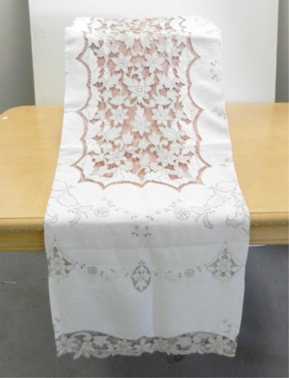 Madeira linen tablecloth and twelve napkins, cutwork an: Madeira linen tablecloth and twelve napkins, cutwork and hand embroidery, 10' 8" long x 5' 6" wide, matching napkins are 18" x 18", early 20th C.