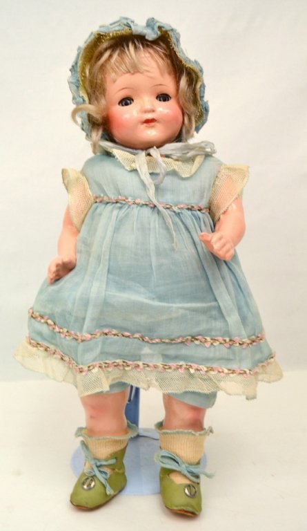 1930-40s Effanbee composition shoulder head doll: 1930-40s Effanbee composition shoulder head doll, cloth body, wearing tagged original clothes, composition arms and legs, blue sleep eyes, painted and applied lashes, painted closed mouth, marked on s