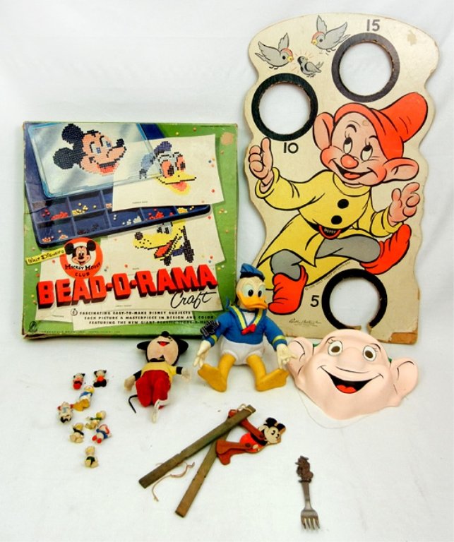 Grouping of Walt Disney memorabilia: Grouping of Walt Disney memorabilia, including Parker Bros. 1938 Dopey bean bag game, Dopey face mask marked Fiori Paolo Italy, Bead-o-Rama, appears complete in box, Woolikin Mickey Mouse, an Applause