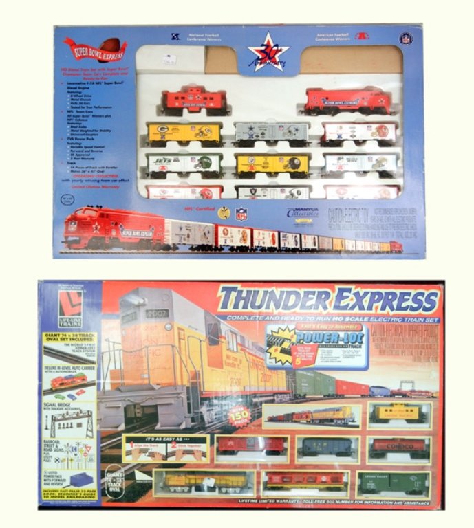 Two H.O. scale train sets: Two H.O. scale train sets in original boxes including Mantua Super Bowl Express and Life-Like Thunder Express, appears new in box