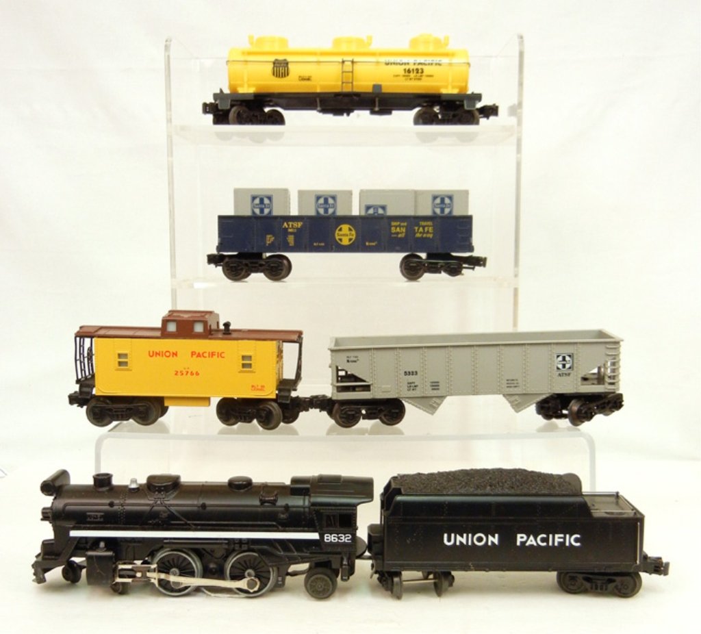 Lionel Union Pacific freight set: Lionel Union Pacific freight set, includes No. 8632 locomotive and tender, No. 16123 tank car, No. 25766 caboose, with K-Line 5323 Sante Fe hopper and No. 5611 Sante Fe gondola with boxes
