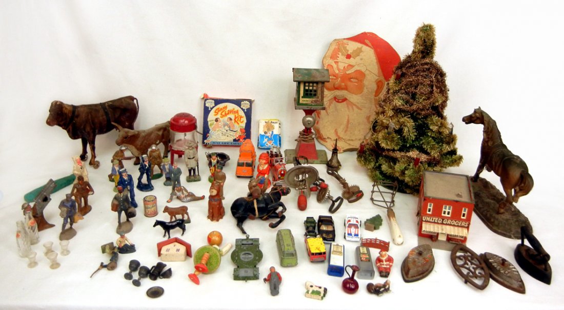Large grouping of vintage toys: Large grouping of vintage toys, includes Barclay figures, miniature metal tea set, miniature glass Pepsi bottles and sundae cups, Betty Taplin toy beaters, Dover sad irons, Matchbox cars, Toledo car, 