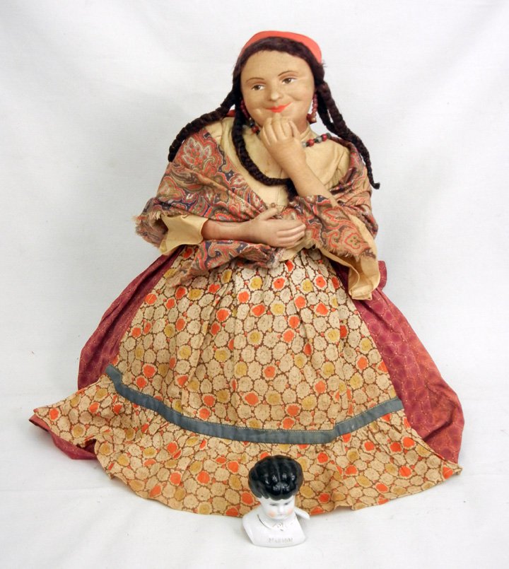 Russian tea cozy stockinette doll, early to mid 20th C.: Russian tea cozy stockinette doll, early to mid 20th C., 19" high, and a German china shoulder head "Marion", marked on back, 3 1/4" high