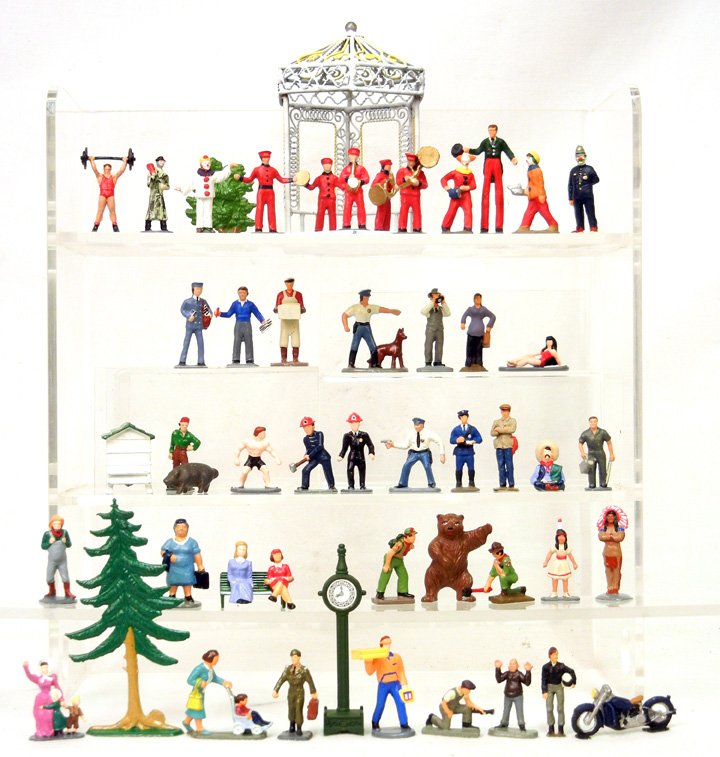 Grouping of fifty-six miniature diecast lead figurines,: Grouping of fifty-six miniature diecast lead figurines, including musicians, gazebo, clowns, Indian, and much more, unmarked