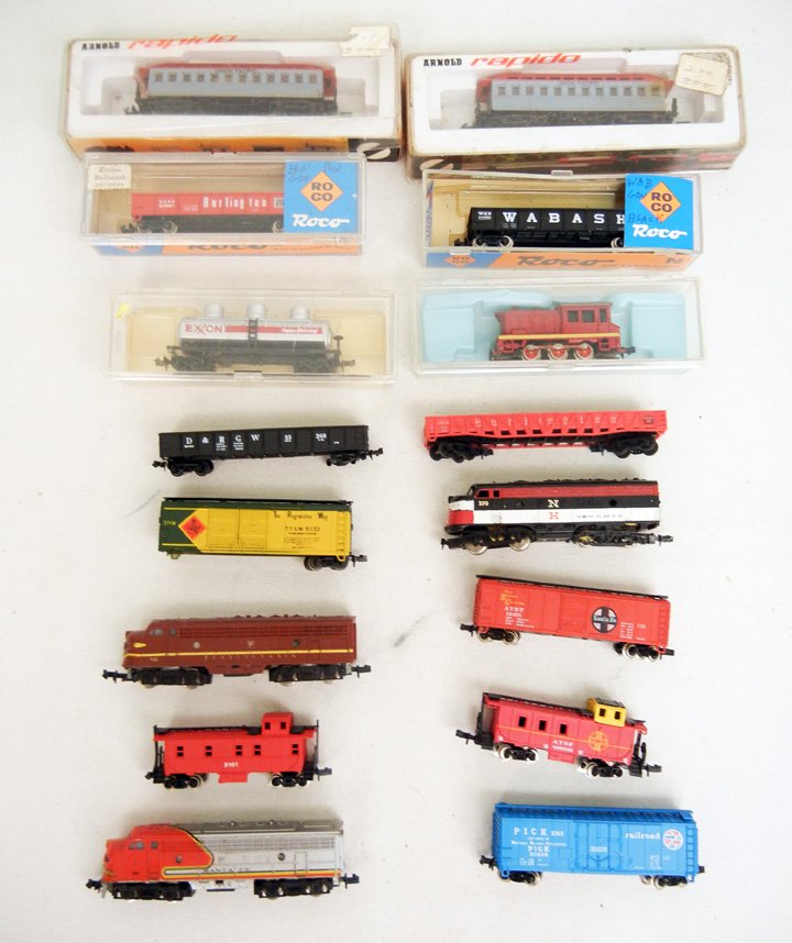 Sixteen N scale trains, including Lima, Rapido, Atlas,: Sixteen N scale trains, including Lima, Rapido, Atlas, Yugoslavia, Roco, Bachmann, Model Power, and Trix Western Germany, six in original containers