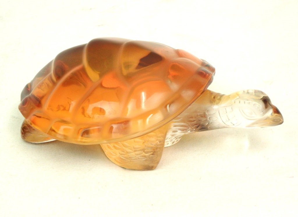 Lalique France crystal Caroline turtle: Lalique France crystal Caroline turtle- amber, signed on bottom, "Cristal Lalique Paris" label, "Made in France" label, 2 1/2" x 6"