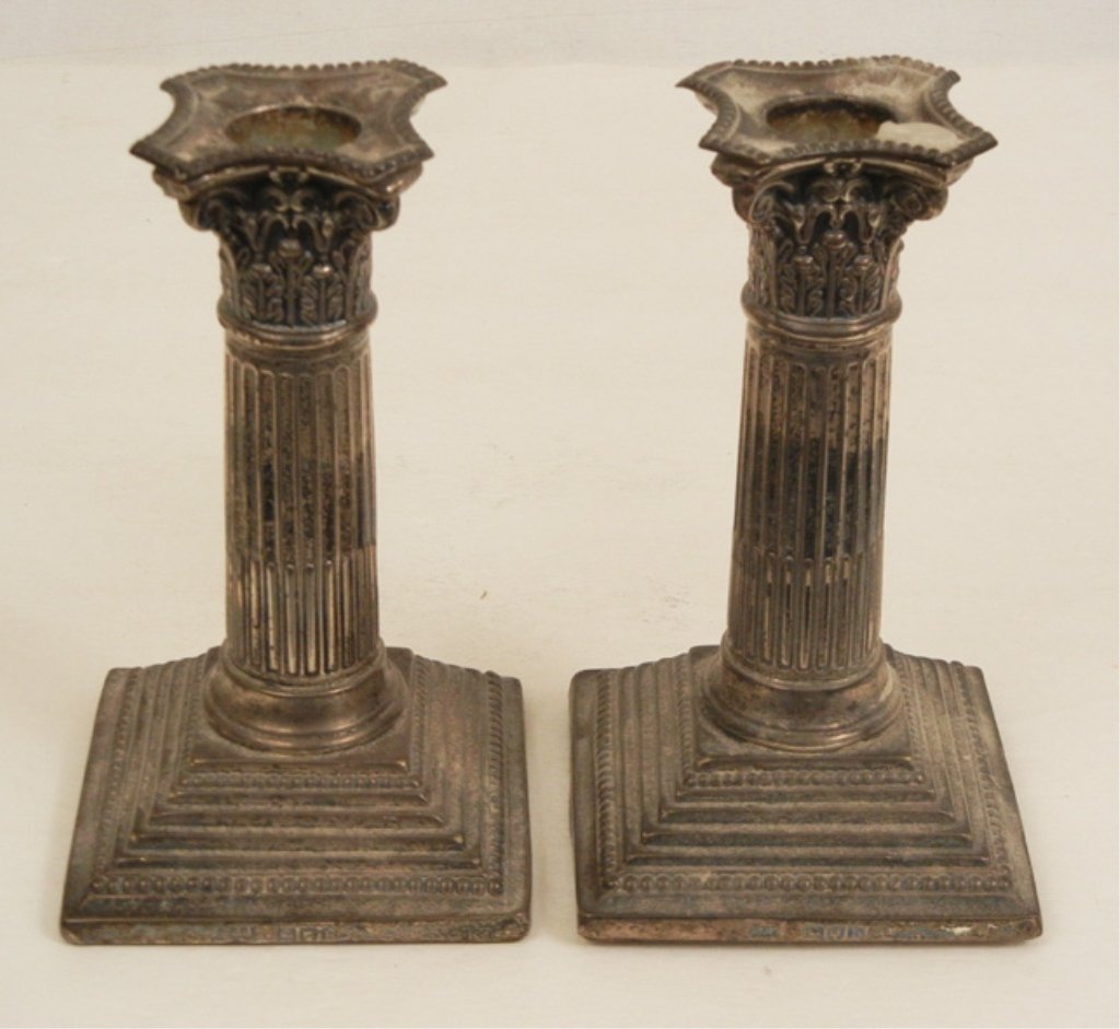 Pair of English sterling candlesticks: Pair of English sterling candlesticks, column form on square bases, London, unknown maker's mark J.J.(possibly Jacob Josephson), weighted, c. 1897, 6 1/4" x 3 1/2"
