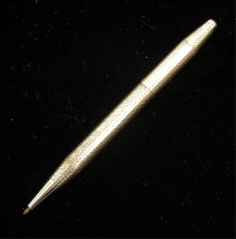 Tiffany & Co. sterling silver pen: Engraved sterling silver pen, 4" long, marked Sterling Tiffany & Co., weight 14.8 grams (complete), mid 20th C.