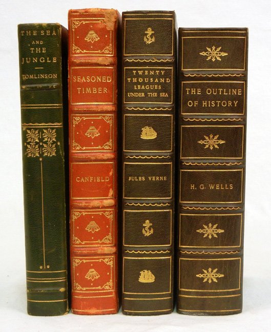 Four 3/4 leather bound books: Four 3/4 leather bound books, The Sea and the Jungle , with woodcuts, by Claire Leighton, ca. 1930 Duckworth, London, T.E.G., Seasoned Timber , published by Harcourt, Brace & Company, illustrated by P