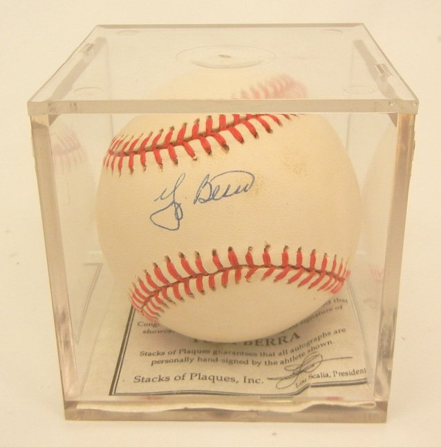 Rawlings Official American League Baseball: Rawlings Official American League Baseball, signed by Yogi Berra, COA by Stacks of Plaques, Inc., in plexiglass cube display