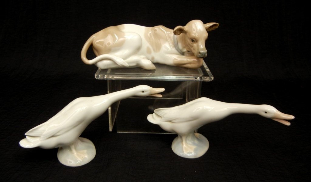 Grouping of three Lladros: Grouping of three Lladros, two of No. 7909 "Ducks", 2 7/8" high, and No. 4680 "Cow", 2 1/4" high, no boxes