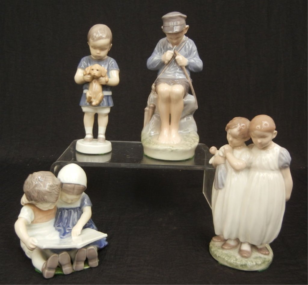 Four porcelain figurines, B&G and Royal Copenhagen: Four porcelain figurines, including B&G "Children Reading" No. 1567, 3 3/4", B&G "Ole" No. 1747, 6 3/4" high, Royal Copenhagen "Boy Carving" No. 905, 7 1/2" high and Royal Copenhagen "Girls with Doll"