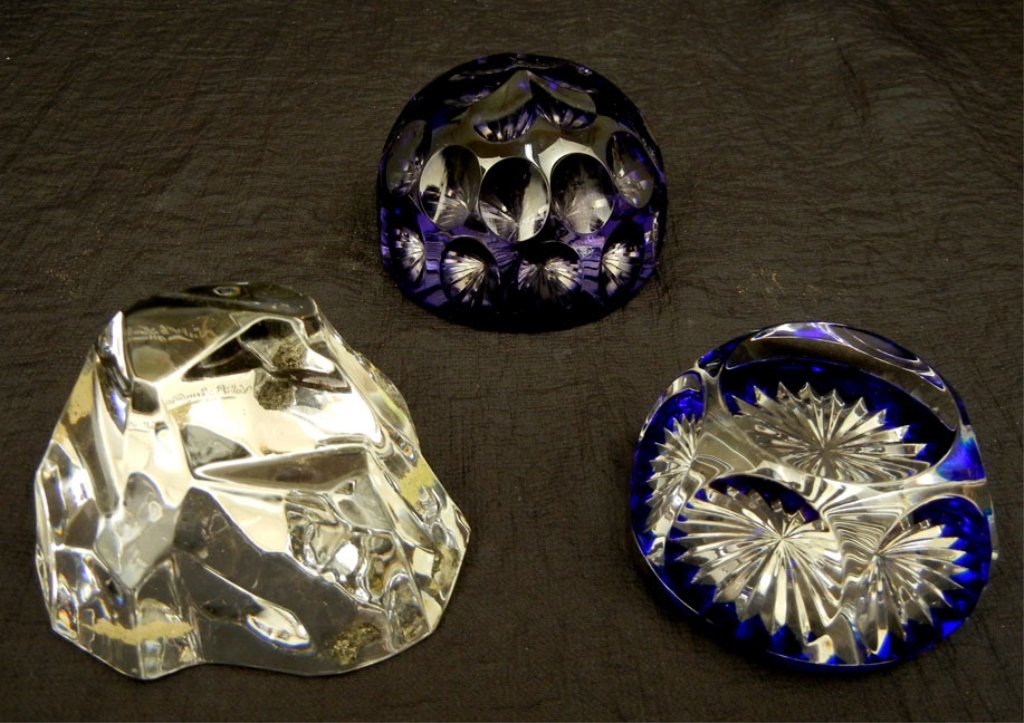 Grouping of three art glass paperweights: Grouping of three art glass paperweights, including a purple one with an acid mark of a crown on bottom, one by Baccarat crystal, with cobalt color, and one by Val St. Lambert, all marked, tallest 2" 