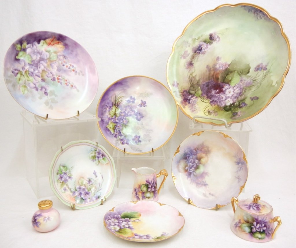 Grouping of hand painted porcelain tableware: Grouping of hand painted porcelain tableware, mostly violet pattern, including a large scalloped rimmed plate, 12 5/8" diameter, marked "M.Z. Austria", two plates 8 3/4" and 8 3/8", one artist signed 