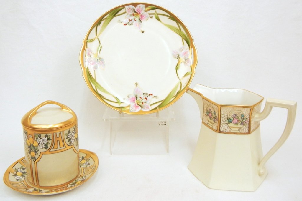 Grouping of hand painted porcelain tableware: Grouping of hand painted porcelain tableware, including Rosenthal Selb Bavaria "Donatello" decorated jam jar with underplate and lid, 5 3/4" high, and 6 1/2" across, T&V Limoge France pitcher with flo