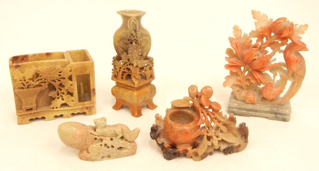Grouping of carved soapstone: Grouping of carved soapstone, including carved phoenix, bird, and florals, mounted on base, with auction slip, 5 1/4" high, one of a vase with florals on stand, cigarette and match holder, depicting v