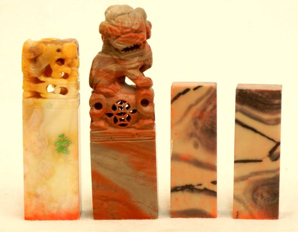 Four soapstone stamps: Four soapstone stamps, one with carved foo dog top, one with carved phoenix top, with auction receipt from 2002 stating they are from the estate of Jane Dupont Lunger, owner of Christiana Stables in C