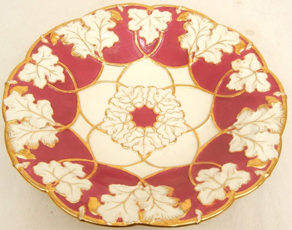 Meissen red and gilt leaf charger: Meissen red and gilt leaf charger, crossed swords blue underglaze mark on bottom, 20th C., 11" diameter