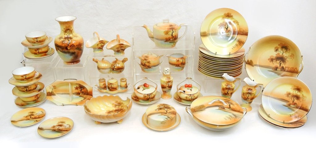 Noritake "Tree in the Meadow" dinnerware set: Noritake "Tree in the Meadow" dinnerware set, fifty-four pieces total, marked on bottoms, including fifteen luncheon plates 8 5/8", three salad plates 7 1/2", creamer 3", sugar bowl with lid 3 1/2", b