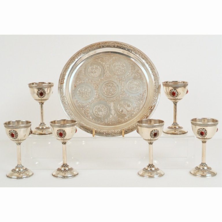 Jeweled sterling silver cordial set: Jeweled sterling silver cordial set, tray with six cordials, three jewels on each cup, tray with decorative design, cups marked inside "Ladon, Made in Israel, Sterling", tray measures 6 3/4" diameter,