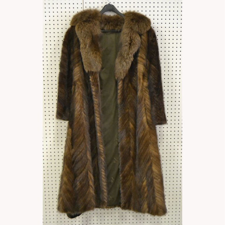 Mink coat with fox collar: Full length A-line brown mink coat with fox collar, made from strips of fur assembled in a chevron pattern, 50" long from nape to hem, 22" long sleeves, Oleg Cassini, size small, late 20th C.