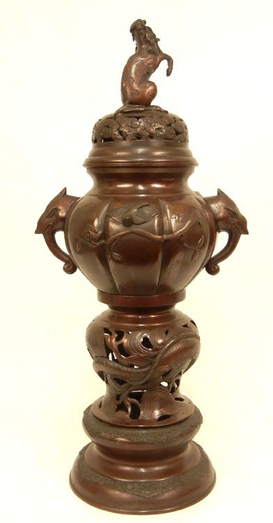 Chinese large bronze incense burner: Chinese large bronze incense burner, foo dog finial, bird head handles, bird motifs, open work around bottom, dragon design, 19th C., 24 1/2" high x 11" across
