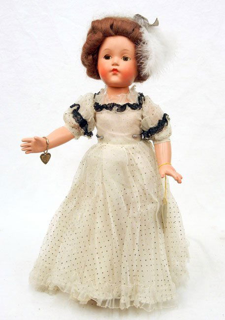 1940's Effanbee composition 18" Little Lady: 1940's Effanbee composition 18" Little Lady doll, near mint, all original with wrist tag and metal Effanbee bracelet, brown sleep eyes, painted and applied lashes, painted closed mouth, wearing dress,