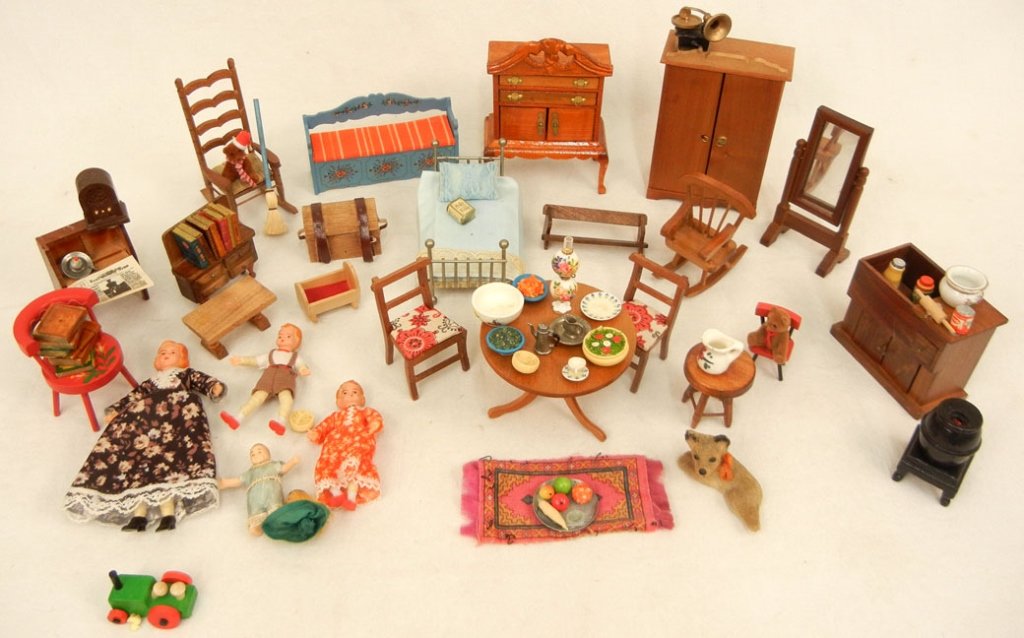 Grouping of vintage doll house furniture: Grouping of vintage doll house furniture, people and accessories, some German, including armoire, full length mirror, table, slant front, dry sink, metal bed, bench, books, Victrola player, chest, and