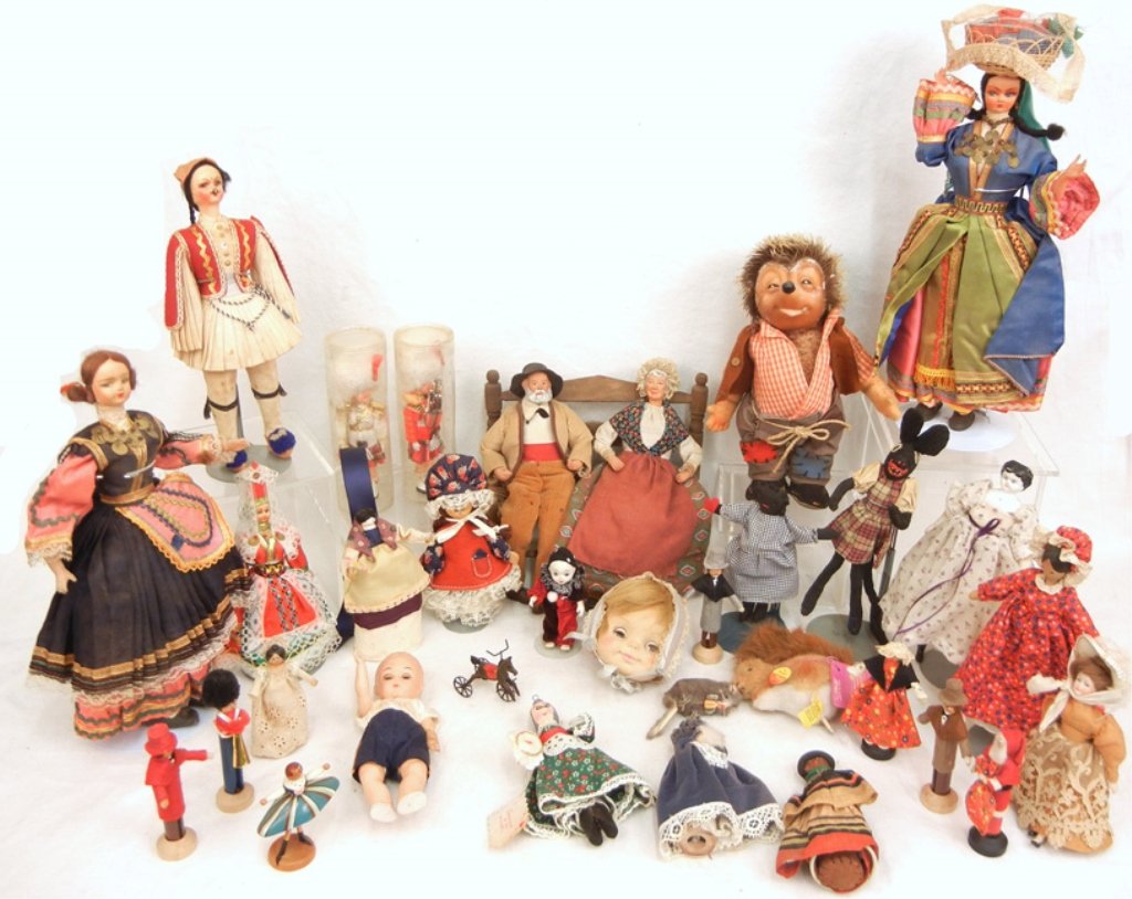 Grouping of assorted dolls: Grouping of assorted dolls, thirty-one total, including stockinette, cloth black doll, hard plastic, bisque wood, china head doll, cloth dressed rat, and an Effanbee doll head, Steiff "Kecki" with tag
