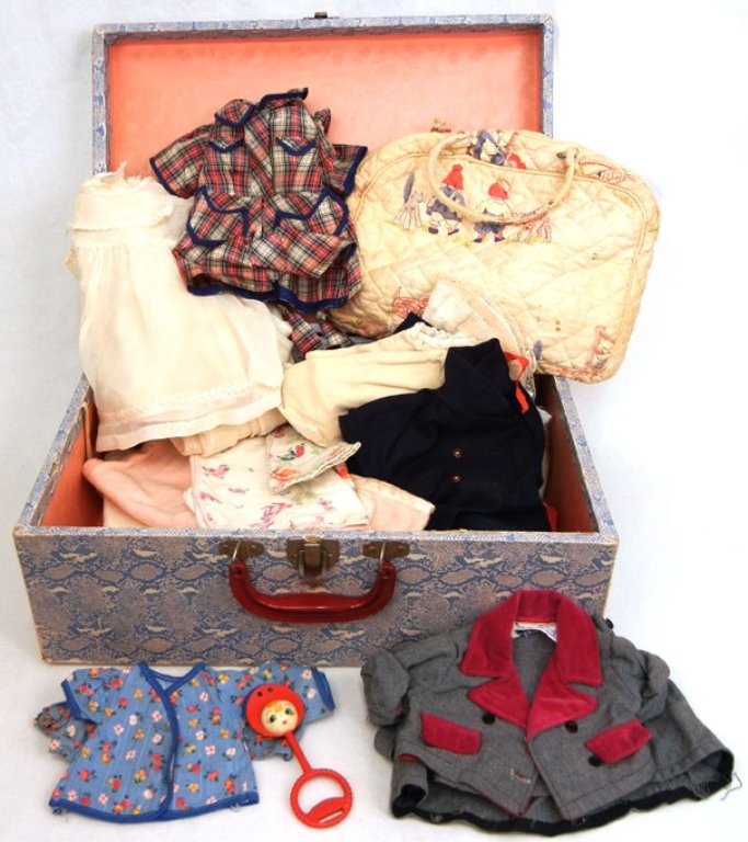 Doll trunk with vintage and antique clothes: Doll trunk with vintage and antique doll clothes, vintage Raggedy-Ann diaper bag, blankets, rattle, some shoes, and more, trunk measures 17 1/2" x 12" x 7"
