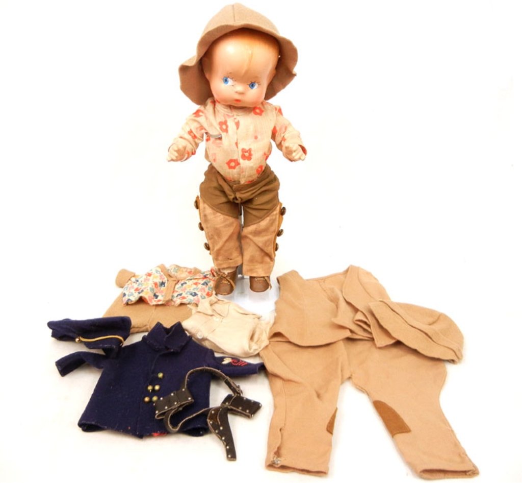 Effanbee "Skippy" 1938-40: Effanbee "Skippy" 1938-40, all composition, painted features, in doll trunk with additional outfits, back of head marked "Effanbee Skippy", eyes have been repainted, 13 1/2" high