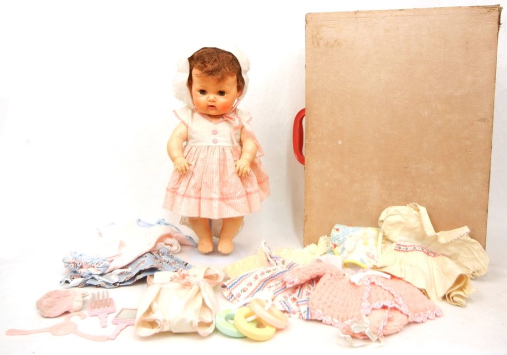 American Character Tiny Tears doll: American Character Tiny Tears doll in trunk with original outfits, including 1950's doll with rubber body, some tanning to face, body very good, marked "American Character Doll, PAT. No. 2.675.644", 1