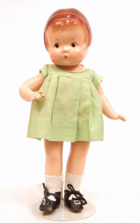 14" Effanbee Patsy: 14" Effanbee Patsy, all composition doll, molded hair, painted features, wearing green dress, slip, socks, and shoes, marked on back "EffanBee Patsy, Pats. Pend. Doll", 13 1/2" high