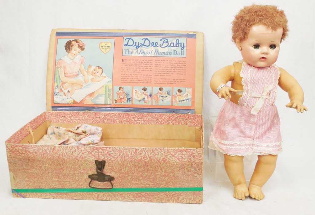 1950's Effanbee 20" Dydee doll in original box: 1950's Effanbee 20" Dydee doll in original box with bottle, hard head, rubber body, applied rubber ears, caracul original wig, logo box, with rattles, bracelet, additional outfits, box measures 21" x