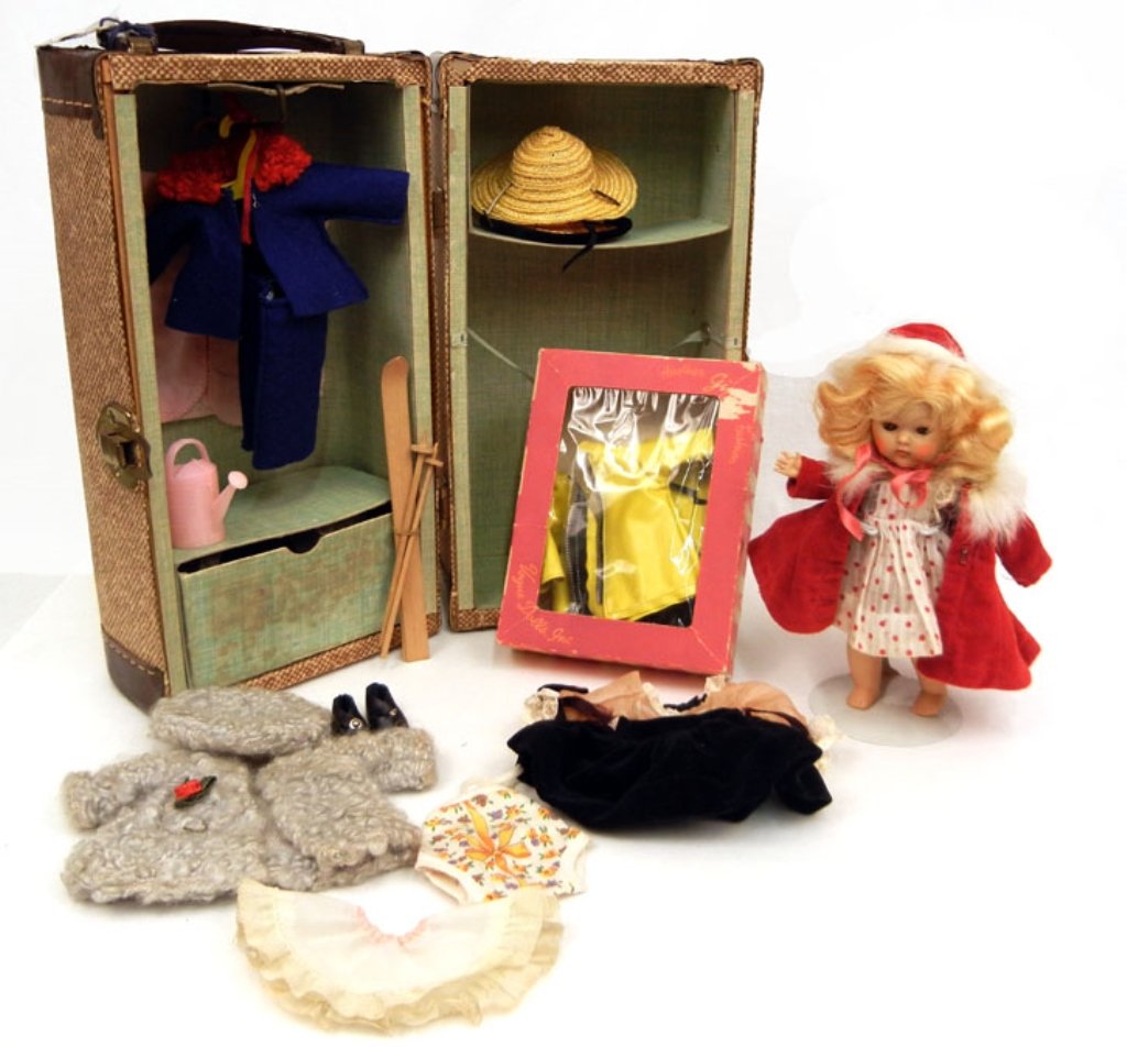 1952 strung Vogue Ginny in Rich Aunt trunk set: 1952 strung Vogue Ginny in Rich Aunt trunk set, with silver Vogue tag, doll, clothes, in original trunk, outfit in Vogue box, trunk measures 12 3/4" x 6 1/2" x 6 5/8"