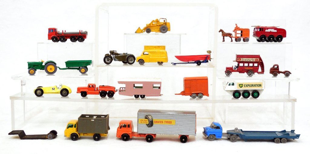 Grouping of Matchbox by Lesney cars: Grouping of Matchbox by Lesney cars, sixteen cars and four additional trailers and truck, including No. 37 Cattle truck, Major Pack No. 2, No. 2 "B" type bus, No. 50 tractor, No. 24 Weatherill Hydraul