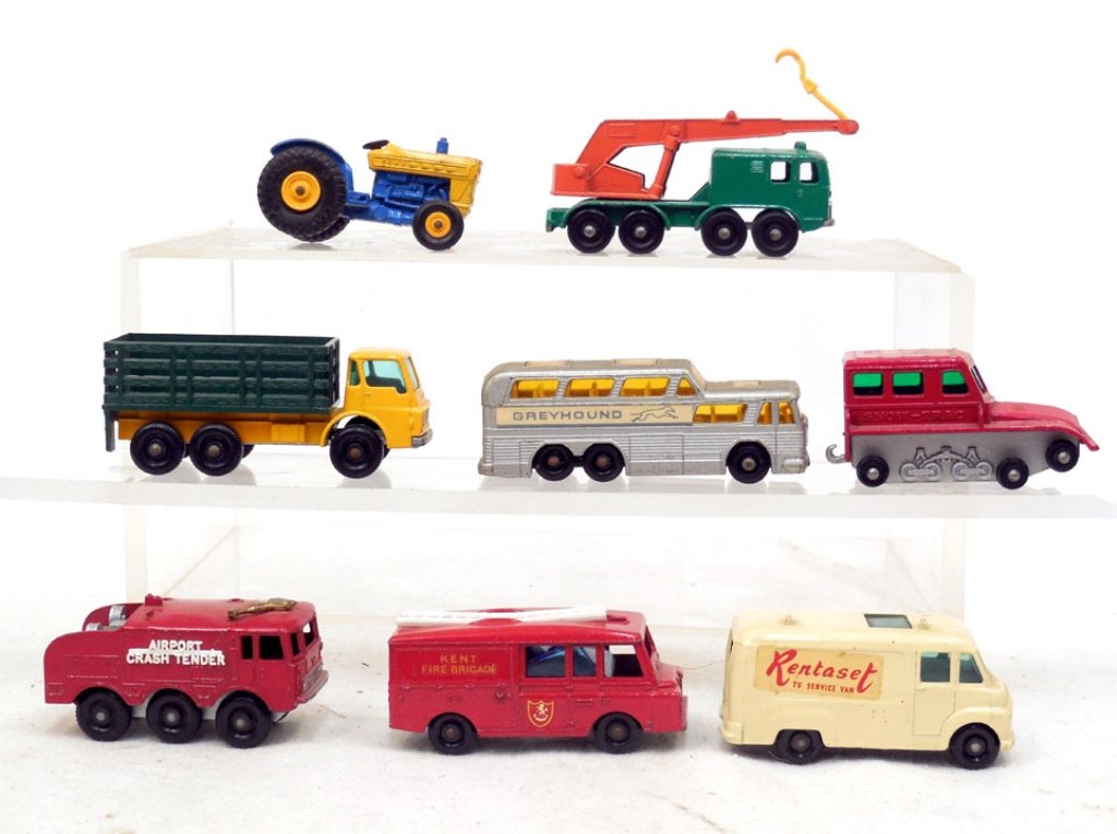 Eight Matchbox by Lesney cars: Eight Matchbox by Lesney cars, includes No. 57 Land Rover Fire Truck, No. 39 Ford Tractor, No. 62 TV Service Van, No. 4 Stake Truck, No. 30 8 Wheel Crane, No. 63 Foamite Crash Tender, No. 35 Snow-Trac