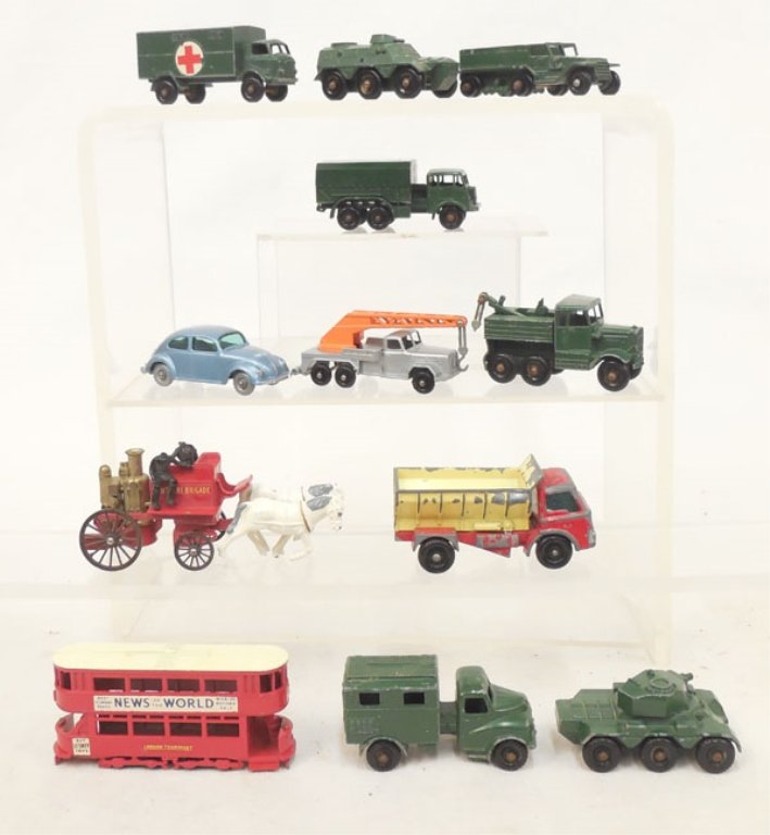 Twelve "Matchbox" by Lesney toy cars: Twelve "Matchbox" by Lesney toy cars, seven are military vehicles, No. 49 M3 Personnel carrier, No. 54 Saragen personnel carrier, No. 62 General Service Lorry, No. 63 Service Ambulance, No. 64 Scammel